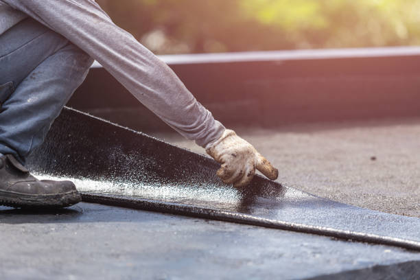 Professional Waterproofing technician working in Jasper, MI